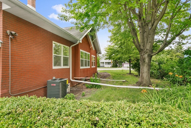 view of yard featuring central AC unit