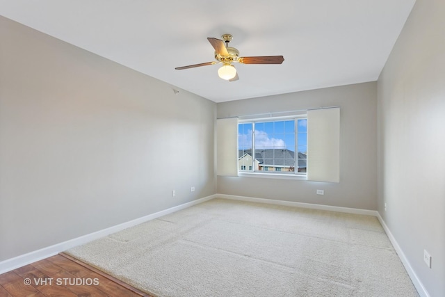 empty room featuring ceiling fan and wood-type flooring