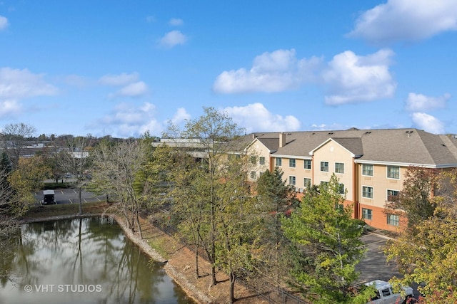 bird's eye view with a water view