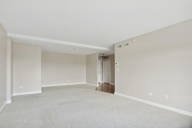 unfurnished room featuring ceiling fan and carpet floors