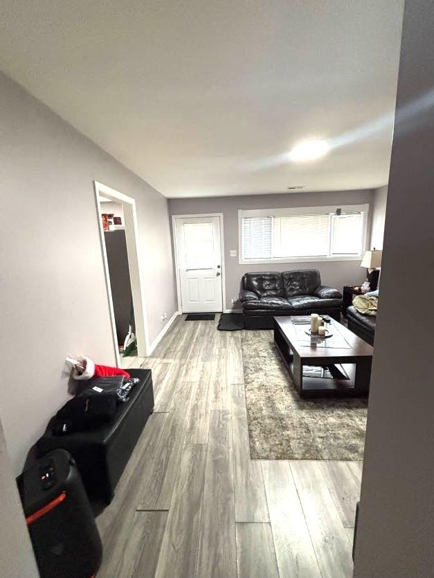 living room featuring light wood-type flooring