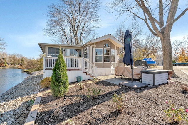 rear view of house with a patio area