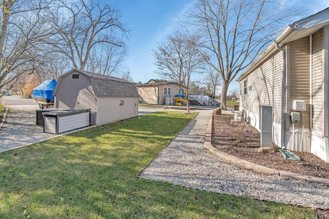 view of yard with a storage shed