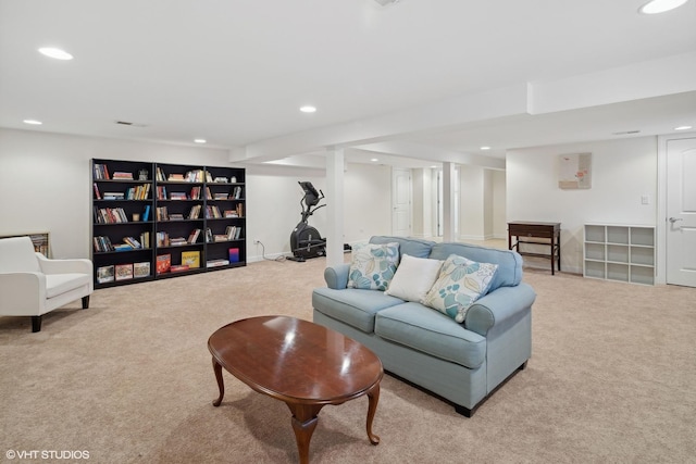 living room featuring light carpet