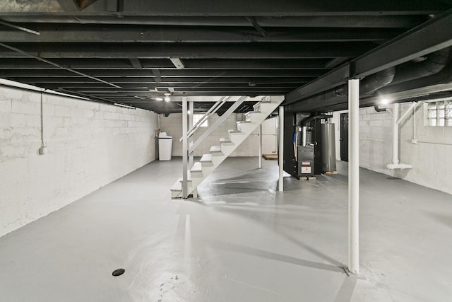 basement with heating unit and water heater