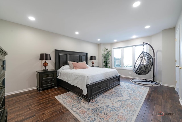 bedroom featuring dark hardwood / wood-style floors