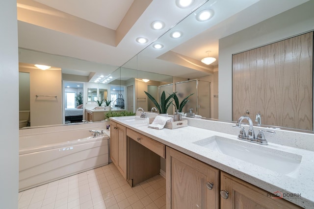 bathroom featuring vanity, tile patterned flooring, a raised ceiling, and walk in shower