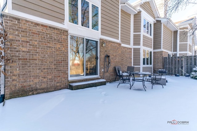 view of snow covered patio