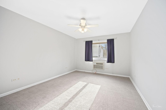 carpeted empty room featuring ceiling fan and a wall mounted AC