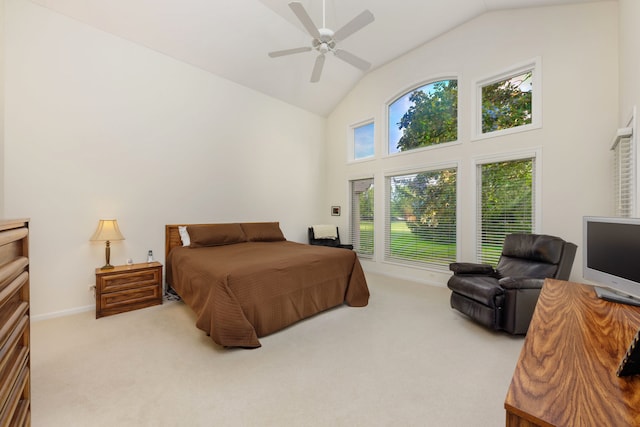 bedroom featuring ceiling fan, lofted ceiling, and light carpet