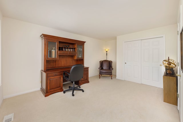 home office featuring light carpet