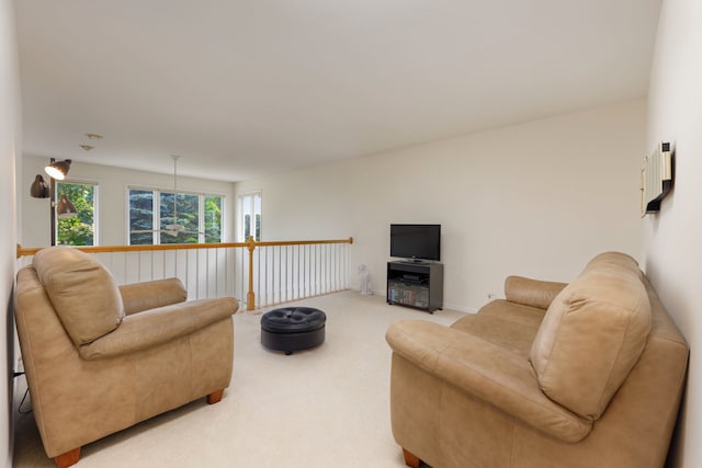 living room featuring light carpet