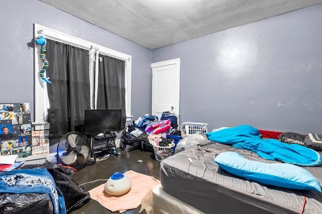 bedroom featuring hardwood / wood-style floors