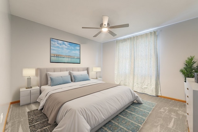 bedroom with ceiling fan and light colored carpet