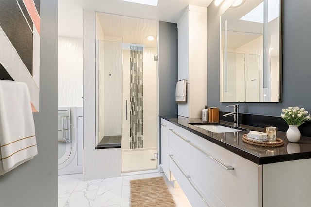 bathroom with vanity and an enclosed shower