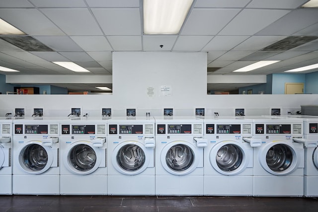 washroom featuring washing machine and clothes dryer