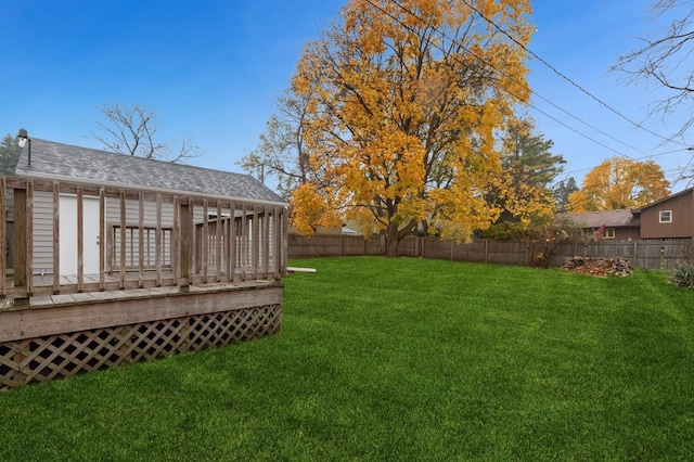 view of yard with a wooden deck