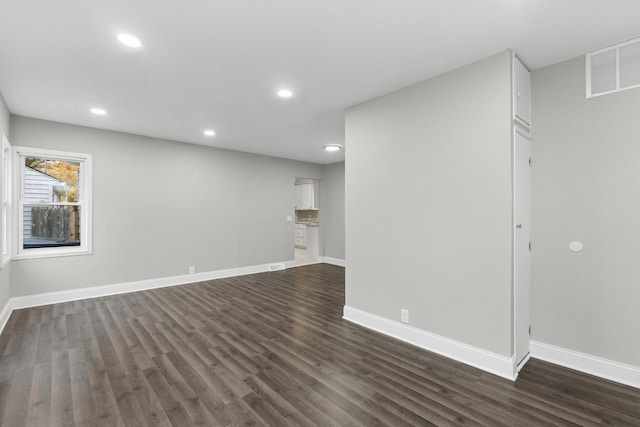 interior space with dark hardwood / wood-style flooring