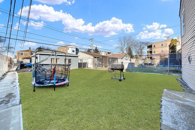 view of yard featuring a trampoline