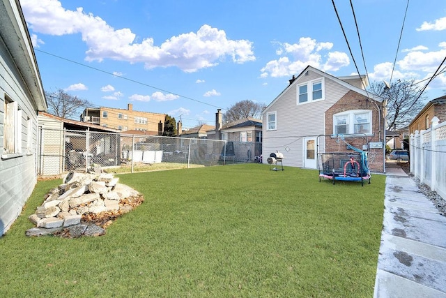 view of yard featuring a trampoline