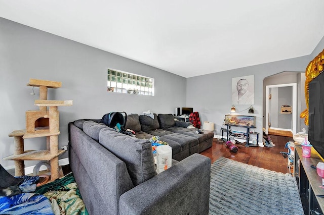 living room with dark hardwood / wood-style floors