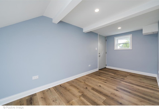 basement featuring wood-type flooring