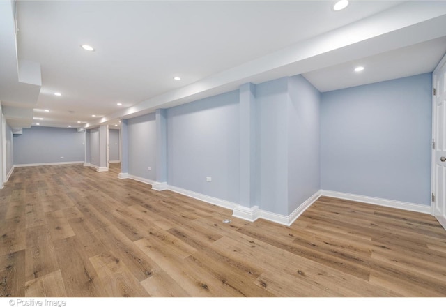 basement featuring light wood-type flooring