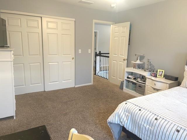 bathroom with vanity, tile patterned floors, and a healthy amount of sunlight