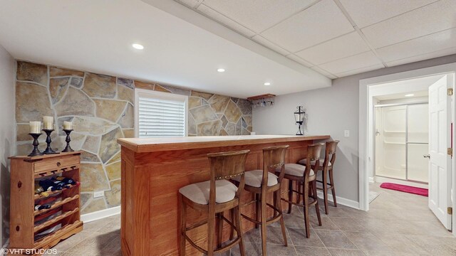 recreation room featuring hardwood / wood-style flooring, a drop ceiling, and pool table