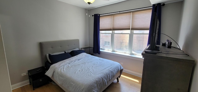 bedroom featuring hardwood / wood-style floors