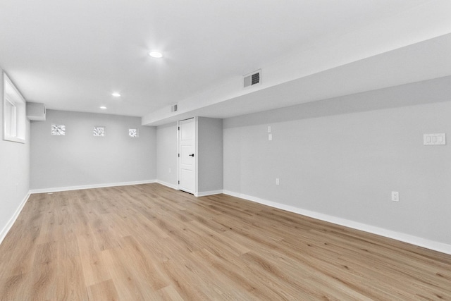 basement with light wood-type flooring