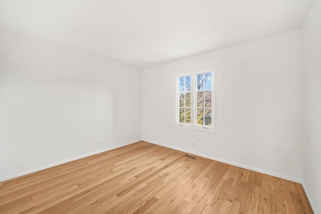 empty room featuring light hardwood / wood-style floors