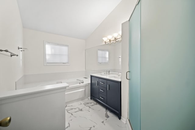 bathroom featuring shower with separate bathtub, vanity, and vaulted ceiling