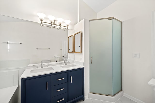 bathroom with vanity, toilet, a shower with shower door, and lofted ceiling