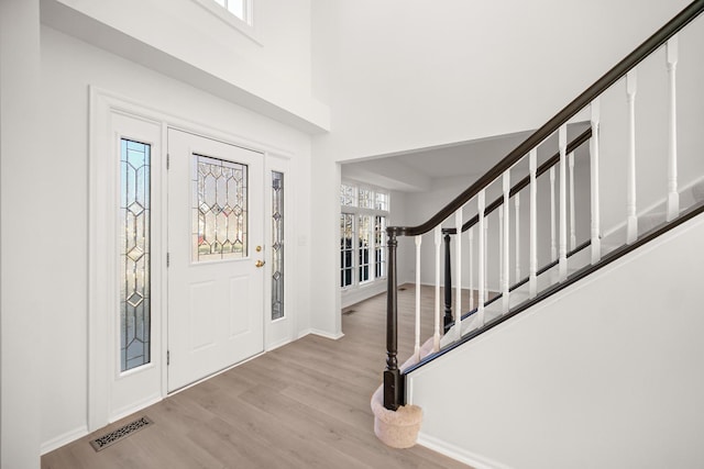 entrance foyer with light hardwood / wood-style floors