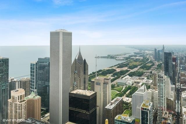 property's view of city featuring a water view