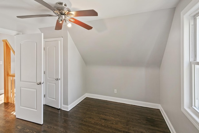 bonus room with dark hardwood / wood-style floors, ceiling fan, and lofted ceiling