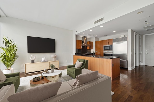 living room with dark hardwood / wood-style floors