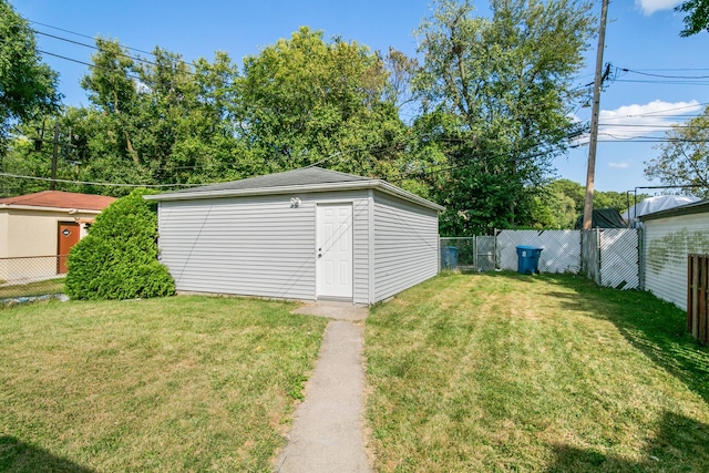 view of outdoor structure with a yard