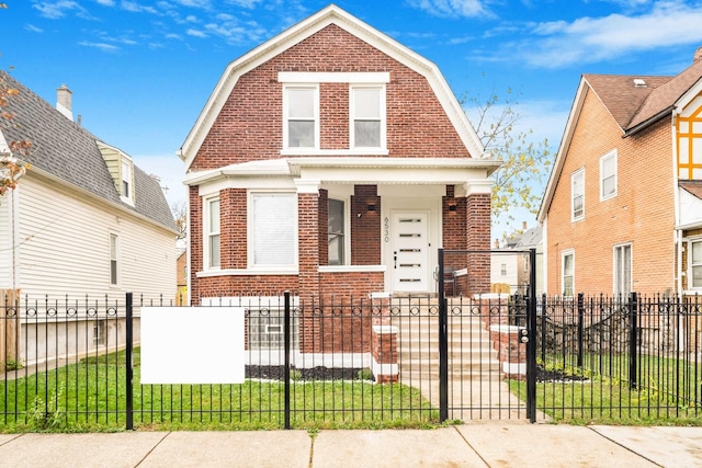 view of front of home with covered porch and a front yard