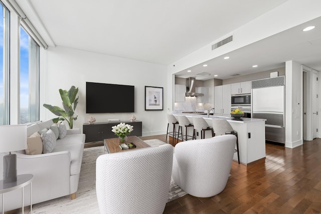 living room featuring dark hardwood / wood-style flooring