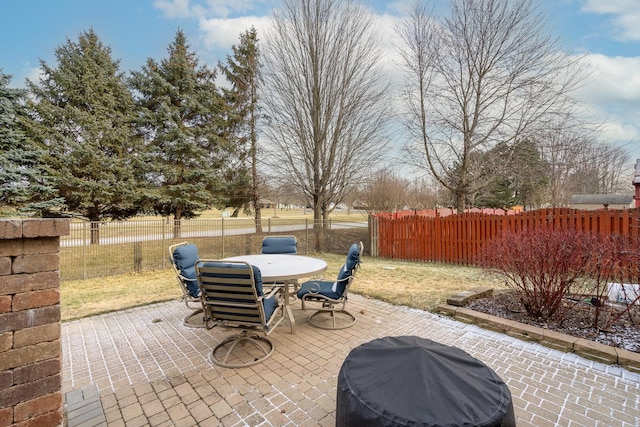 view of patio with a grill