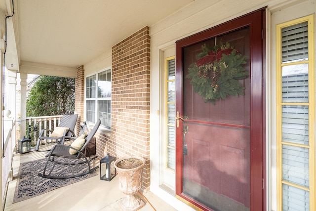 property entrance featuring covered porch