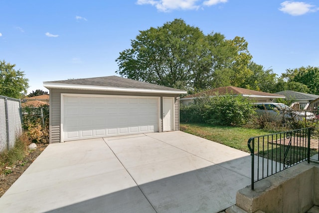 detached garage with fence