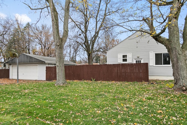 view of yard featuring a garage