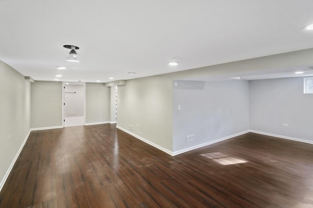 basement featuring dark wood-type flooring