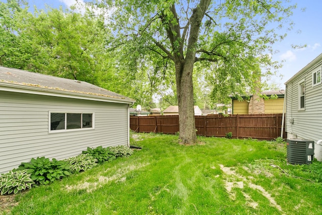 view of yard with central AC