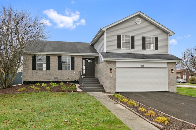 split level home with a garage and a front yard