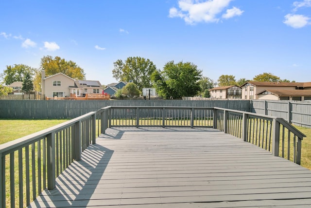 wooden deck with a yard