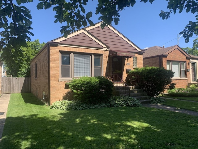 view of front of property with a front yard